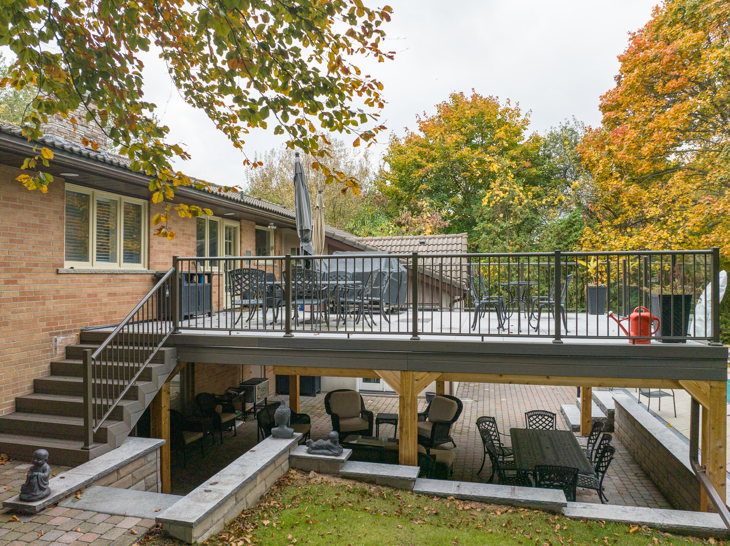 Elevated composite deck with black aluminum railing